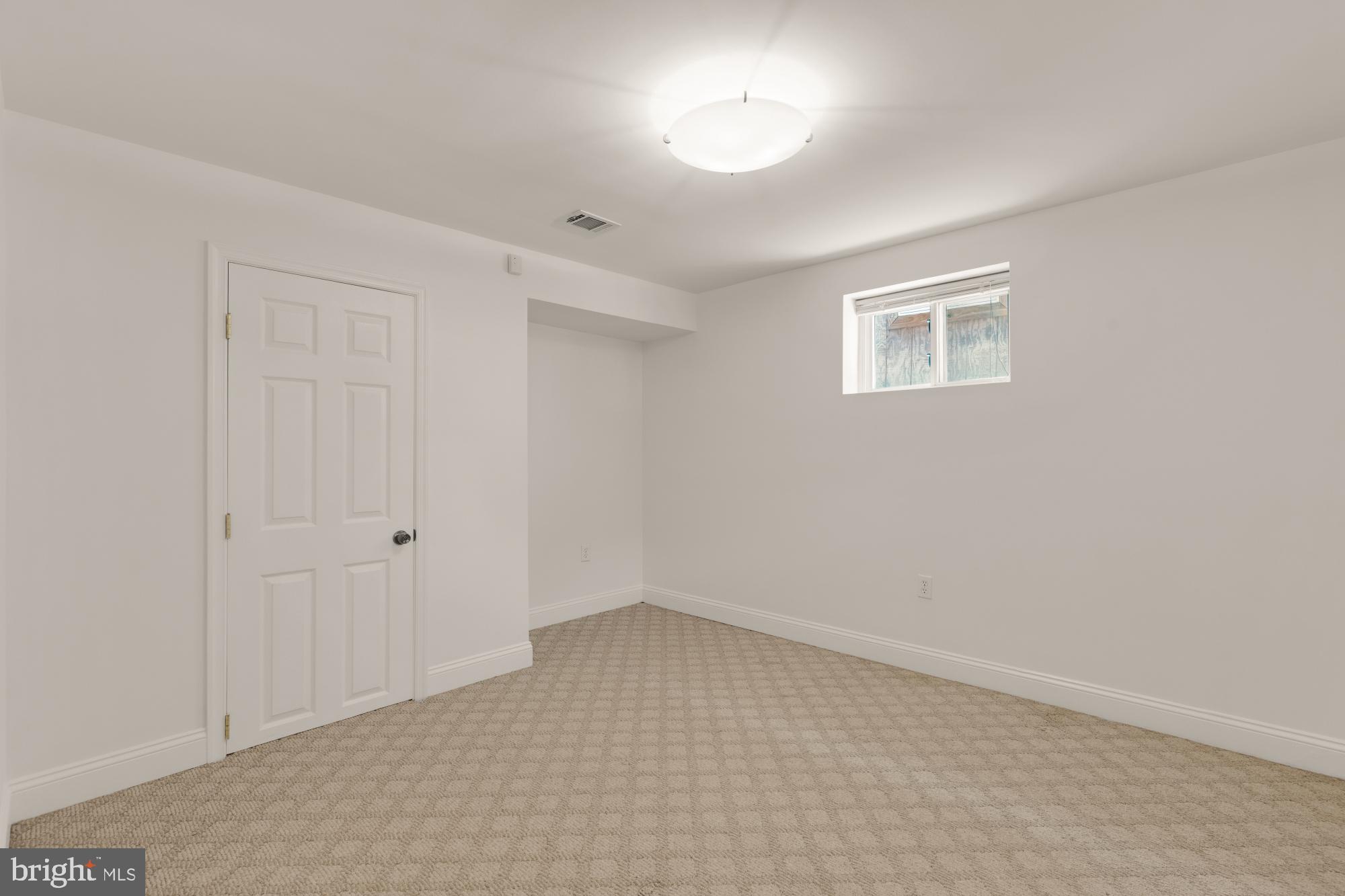 9811 Dallas Avenue Silver Spring, MD 20901 - Photo 38 of 45 wooden floor in an empty room
