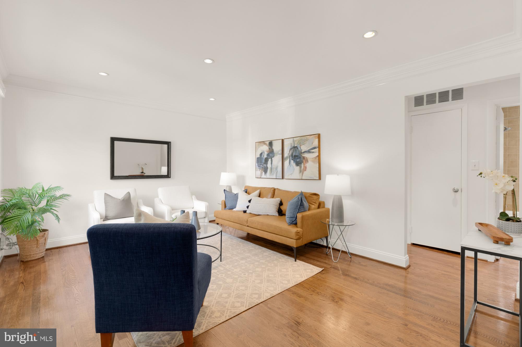 9811 Dallas Avenue Silver Spring, MD 20901 - Photo 6 of 45 a living room with furniture and wooden floor