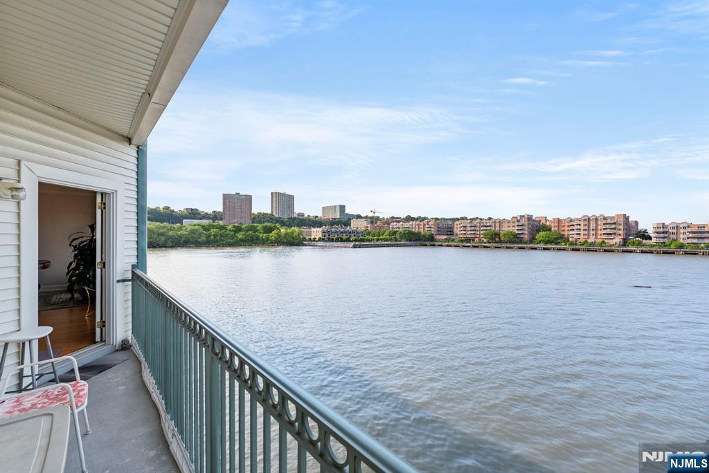 108 The Promenade, Unit 108 Edgewater, NJ 07020 - Photo 20 of 49 a view of a lake with a outdoor space
