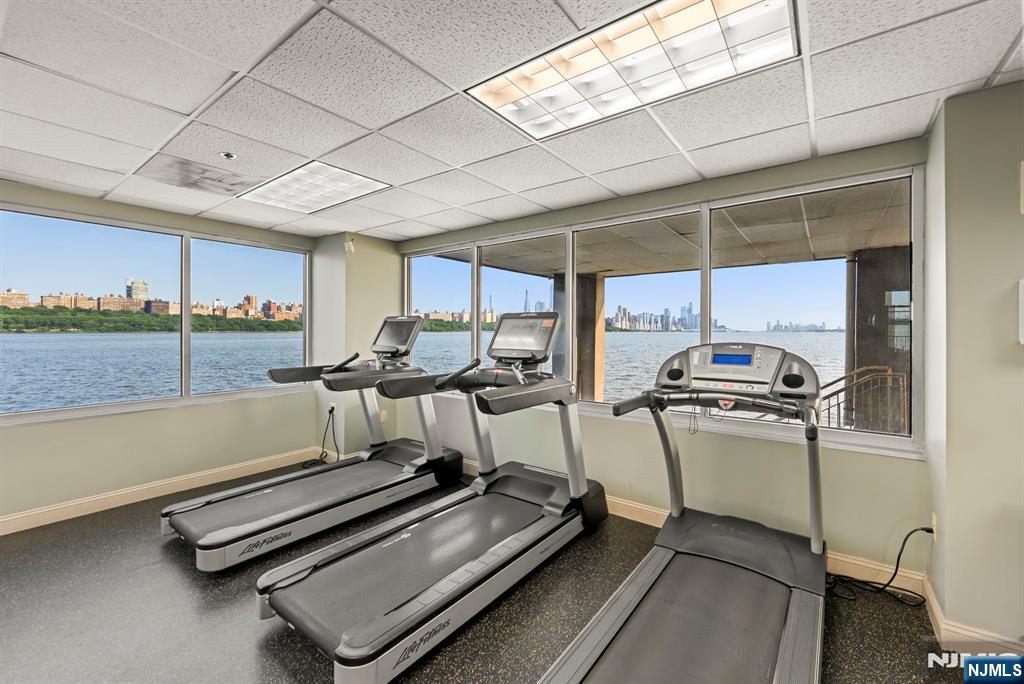 108 The Promenade, Unit 108 Edgewater, NJ 07020 - Photo 48 of 49 a view of a room with gym equipment