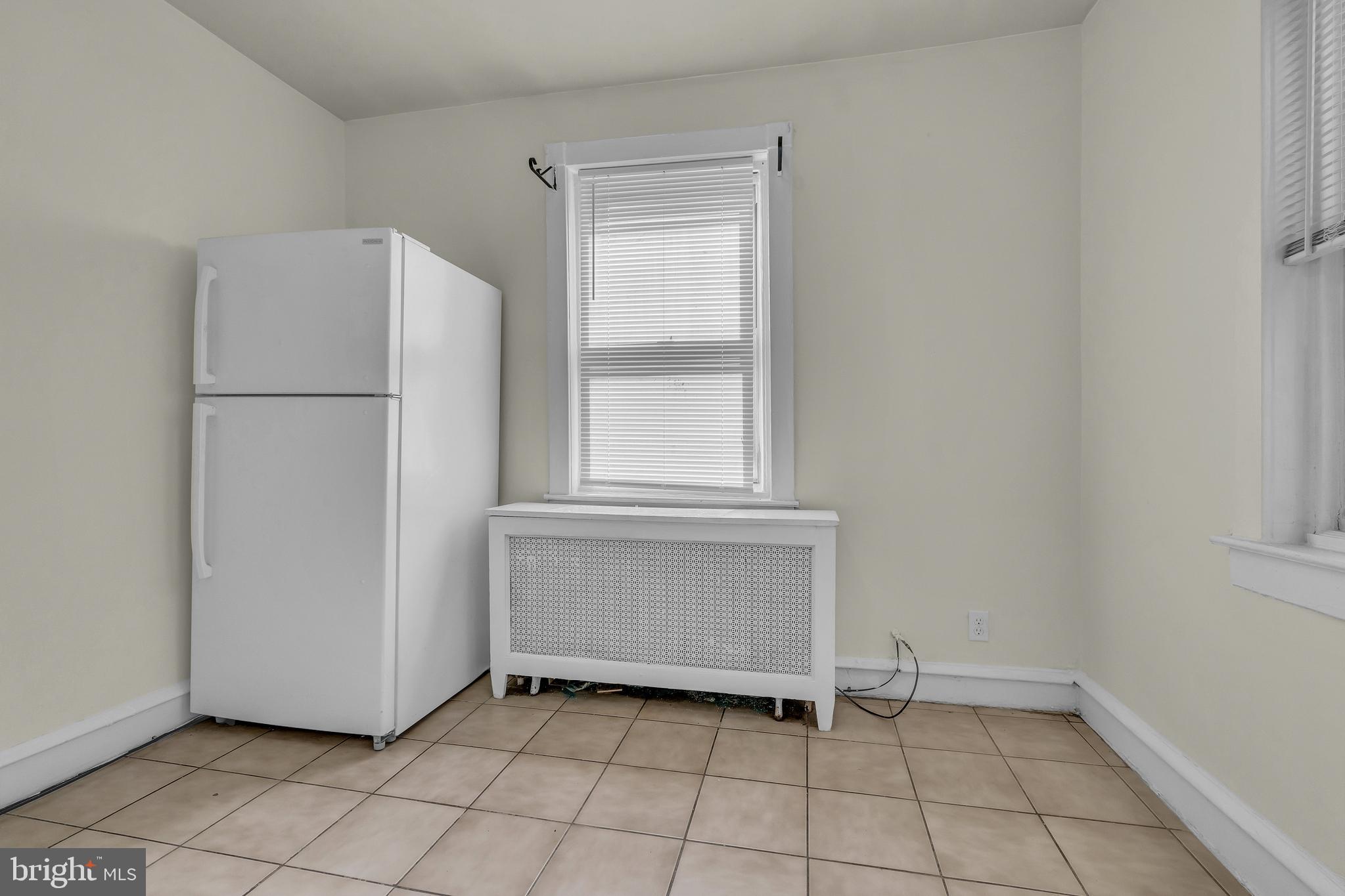 5121 East Roosevelt Boulevard, Unit 2 Philadelphia, PA 19124 - Photo 17 of 23 a view of an empty room with a window