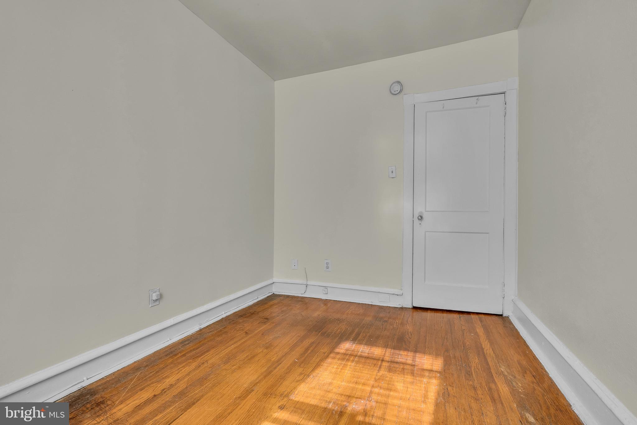 5121 East Roosevelt Boulevard, Unit 2 Philadelphia, PA 19124 - Photo 20 of 23 a view of an empty room with wooden floor