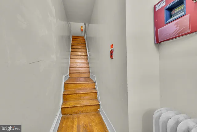 a view of entryway with wooden floor