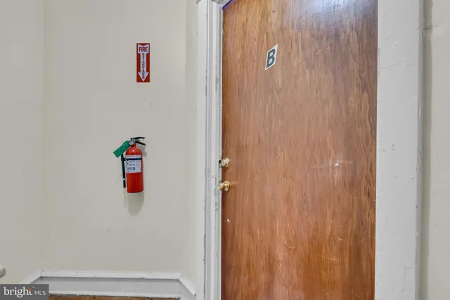 a bathroom with a shower and a shower curtain