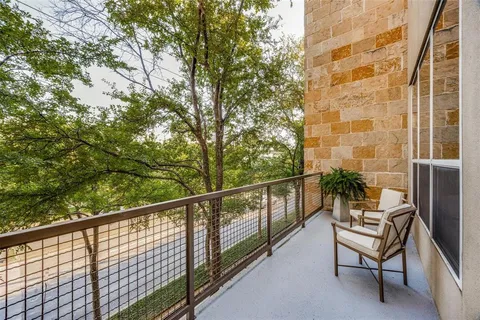 a view of a chairs in a balcony