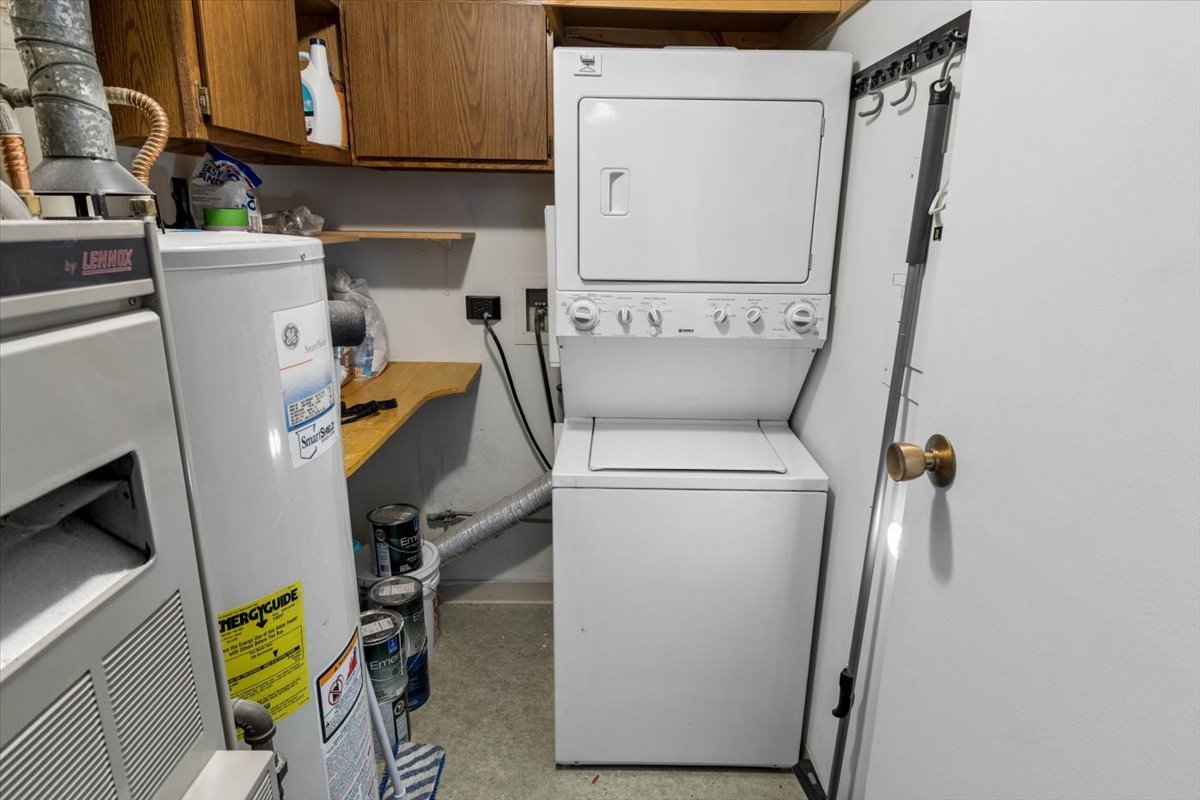 1733 Harrow Court, Unit B Wheaton, IL 60189 - Photo 23 of 23 a utility room with dryer and washer