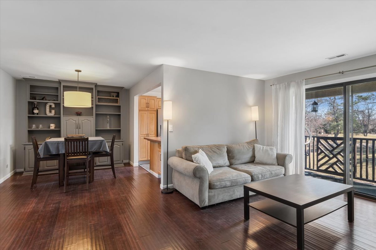 1733 Harrow Court, Unit B Wheaton, IL 60189 - Photo 10 of 23 a living room with furniture and wooden floor