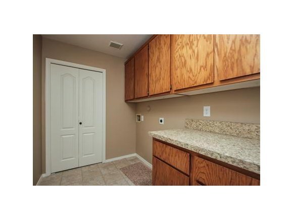 11975 Rawhide Ridge Dewey, AZ 86327 - Photo 12 of 14 a kitchen with a sink and cabinets