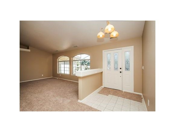11975 Rawhide Ridge Dewey, AZ 86327 - Photo 3 of 14 a living room with a white cabinets