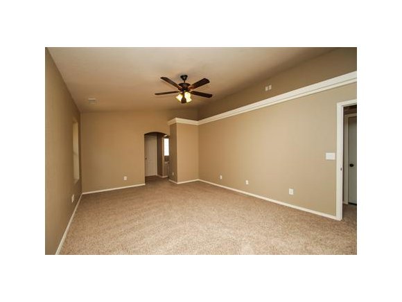 11975 Rawhide Ridge Dewey, AZ 86327 - Photo 8 of 14 a view of a room with a ceiling fan