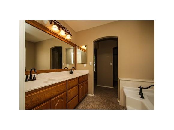 11975 Rawhide Ridge Dewey, AZ 86327 - Photo 9 of 14 a bathroom with a sink double vanity