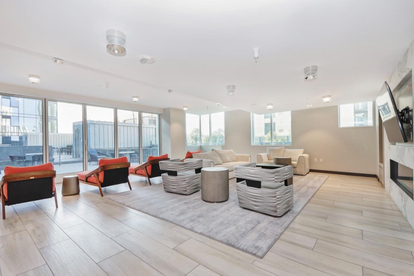 188 West St James Street, Unit 10819 San Jose, CA 95110 - Photo 26 of 41 a living room with furniture and large windows