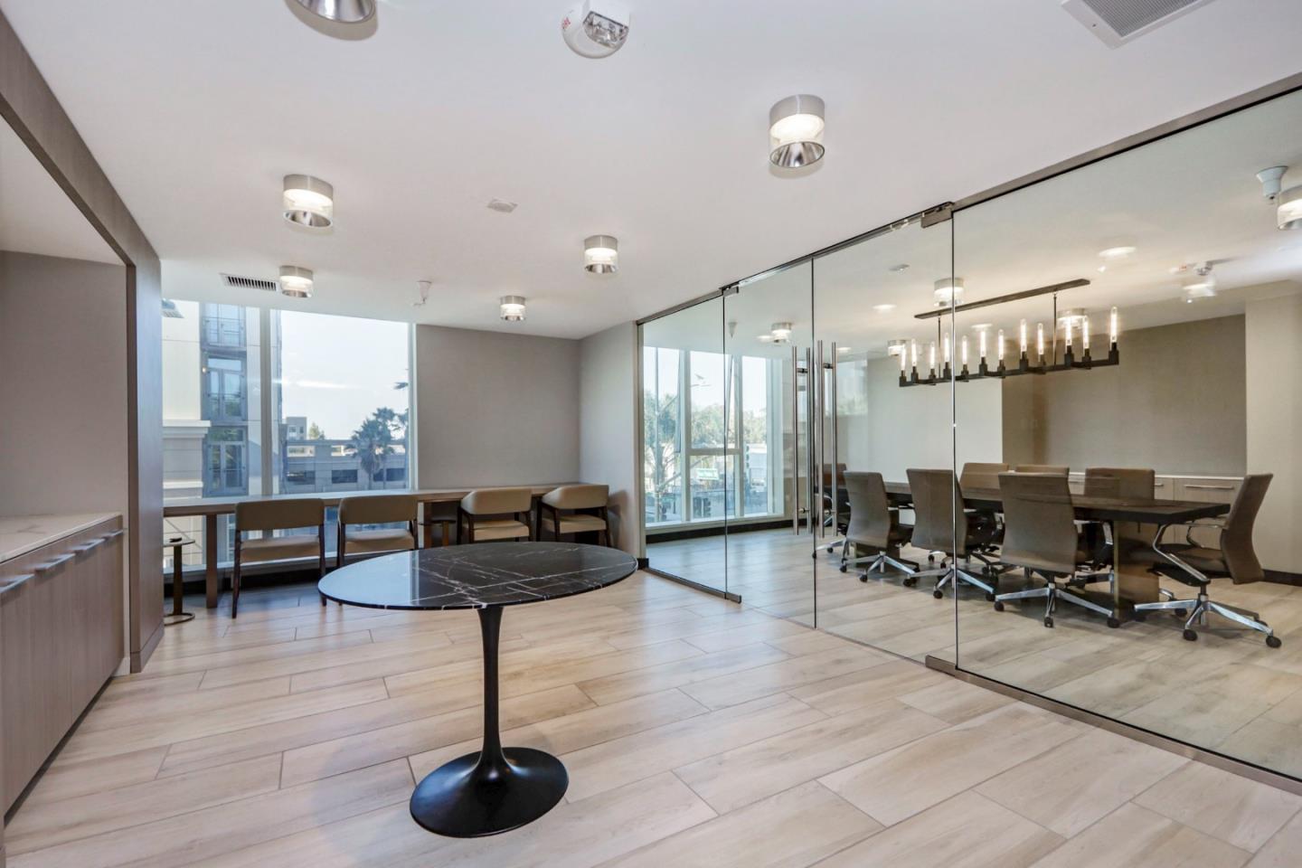 188 West St James Street, Unit 10819 San Jose, CA 95110 - Photo 27 of 41 a living room with furniture and a large window