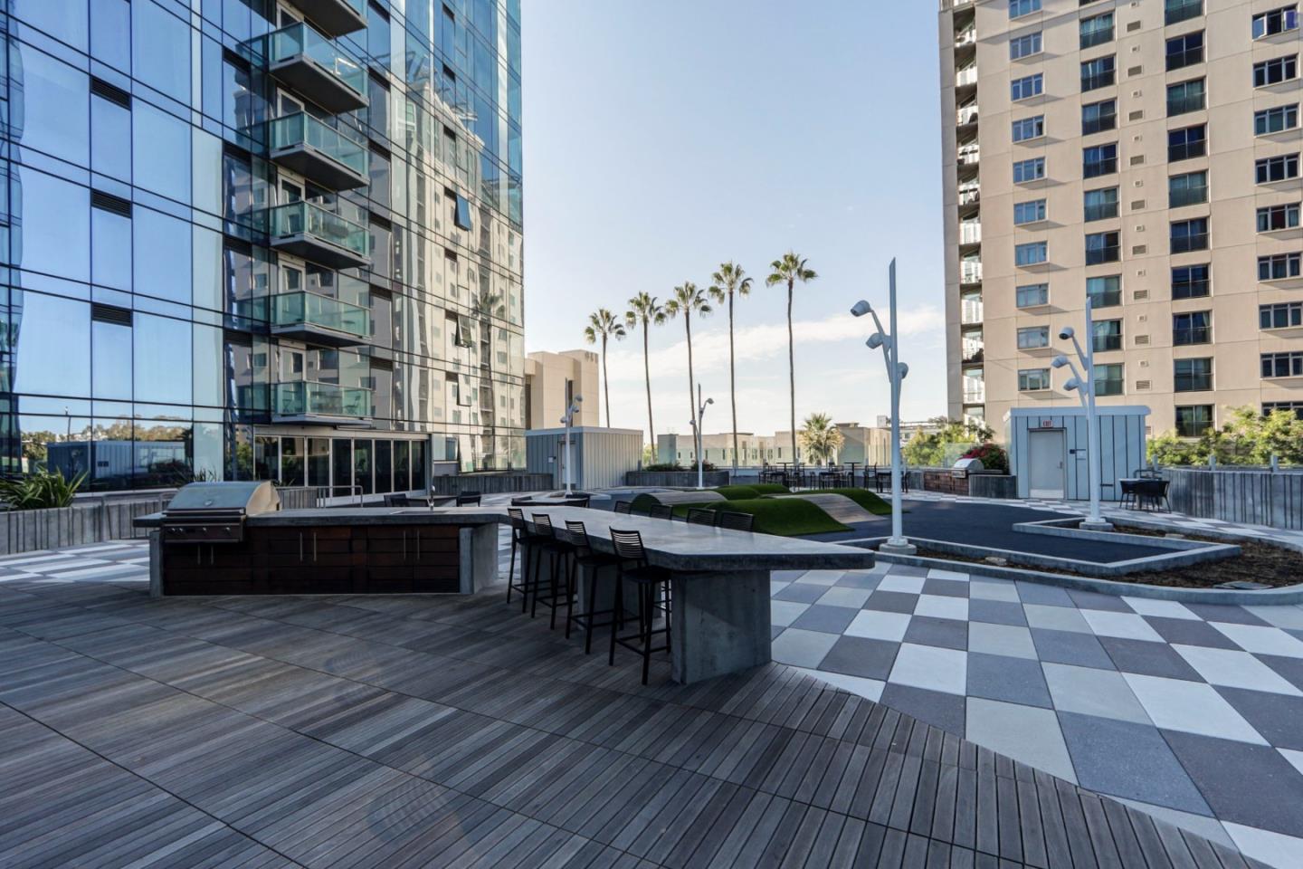 188 West St James Street, Unit 10819 San Jose, CA 95110 - Photo 30 of 41 a view of a balcony with chairs and wooden floor