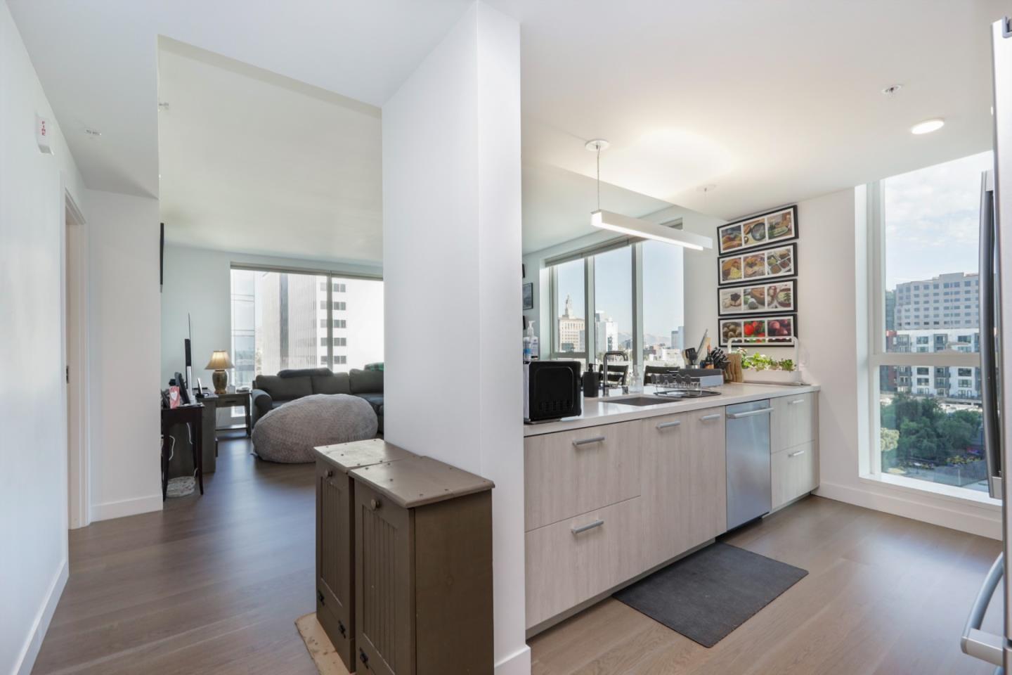 188 West St James Street, Unit 10819 San Jose, CA 95110 - Photo 9 of 41 a open kitchen with stainless steel appliances granite countertop a stove and a refrigerator