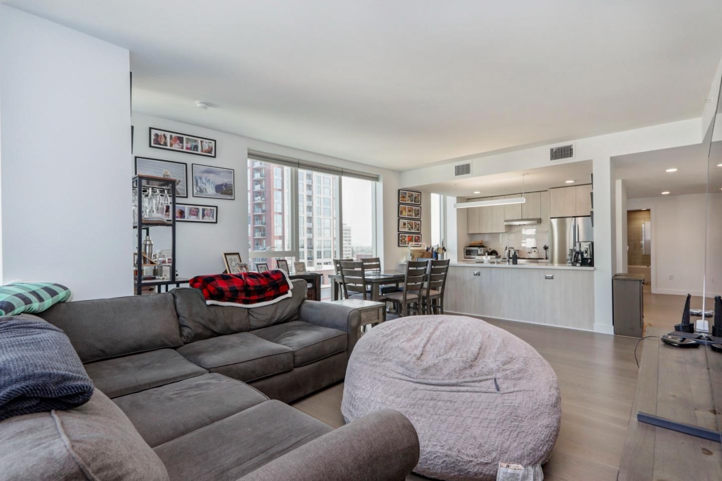 188 West St James Street, Unit 10819 San Jose, CA 95110 - Photo 10 of 41 a living room with furniture and a large window