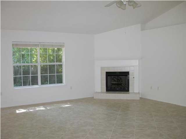 3892 Mesa Road Destin, FL 32541 - Photo 2 of 12 a view of an empty room with a window
