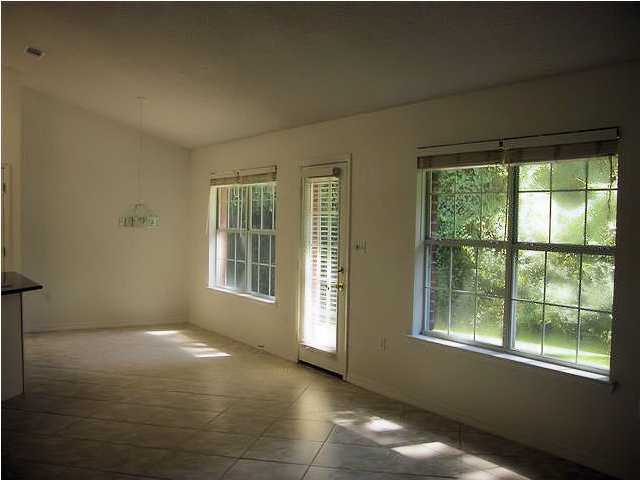 3892 Mesa Road Destin, FL 32541 - Photo 6 of 12 a view of an empty room with a window