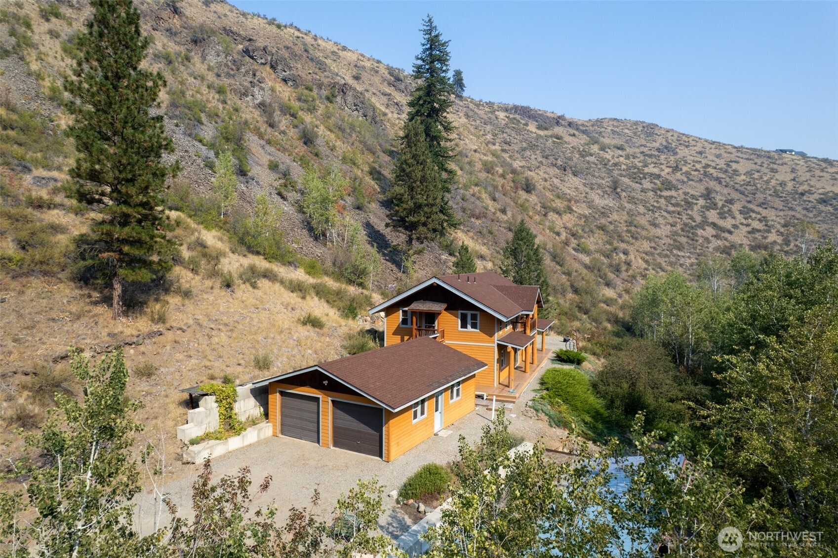 96 Alder Creek Road Twisp, WA 98856 - Photo 3 of 40 an aerial view of a house with a yard