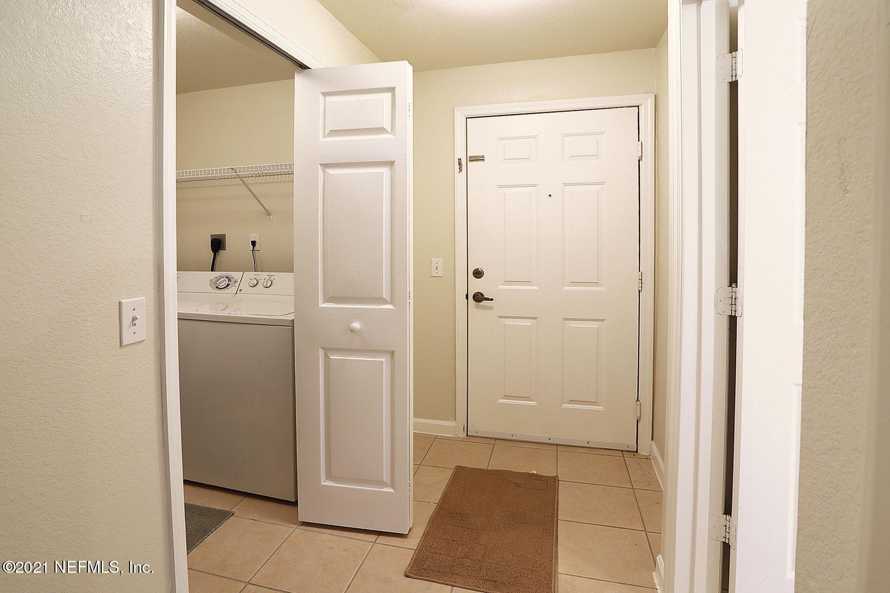 8550 Touchton Road, Unit 1714 Jacksonville, FL 32216 - Photo 20 of 25 FOYER AND LAUNDRY