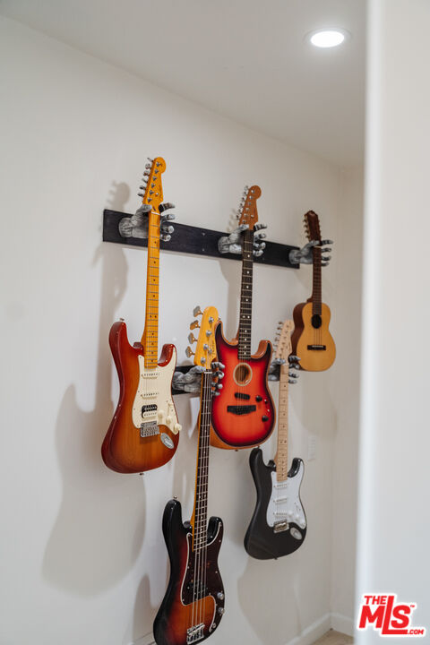 1636 Queens Road Los Angeles, CA 90069 - Photo 14 of 50 a bathroom with a sink and a mirror