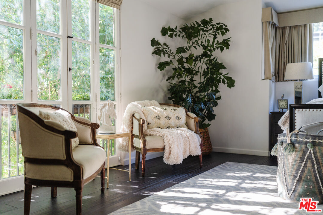 1636 Queens Road Los Angeles, CA 90069 - Photo 18 of 50 a living room with furniture and a potted plant