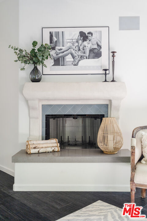1636 Queens Road Los Angeles, CA 90069 - Photo 19 of 50 a living room with furniture and a fireplace