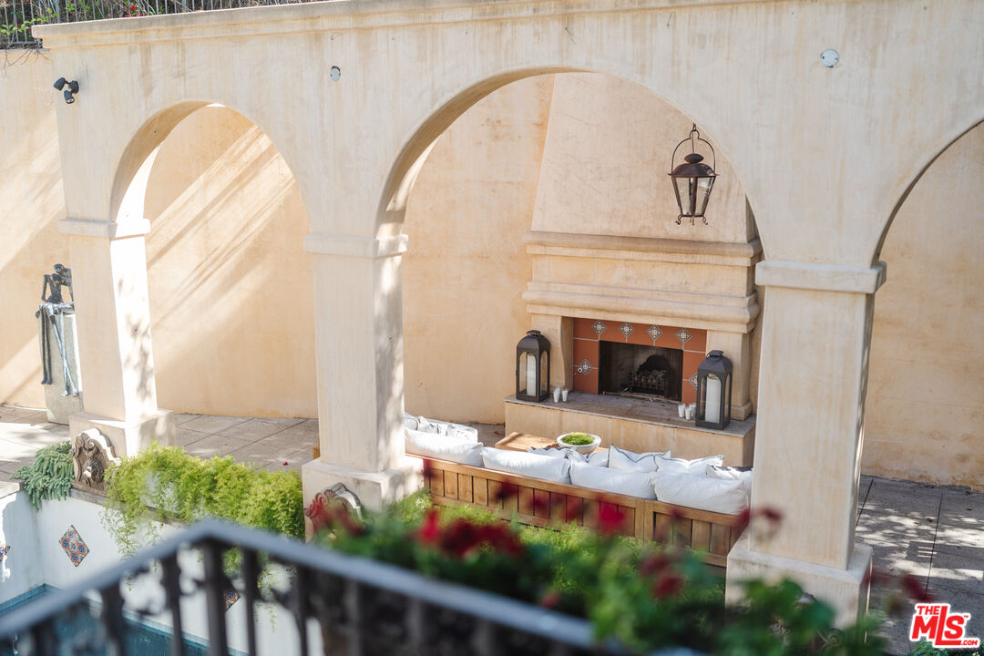 1636 Queens Road Los Angeles, CA 90069 - Photo 33 of 50 a front view of a house with yard