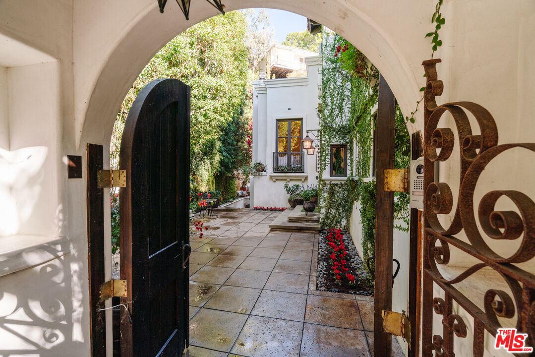 1636 Queens Road Los Angeles, CA 90069 - Photo 46 of 50 a view of a entryway door of the house
