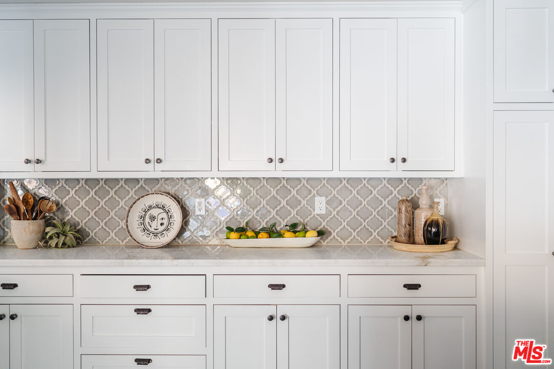 1636 Queens Road Los Angeles, CA 90069 - Photo 8 of 50 a view of white cabinets and a wooden floor