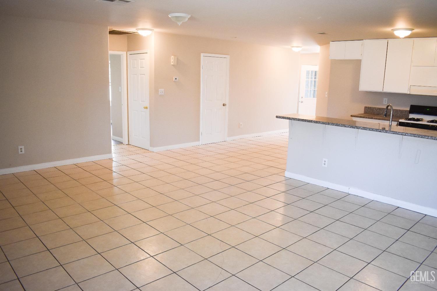 Undisclosed Address Bakersfield, CA 93307 - Photo 5 of 20 a view of a kitchen with a sink