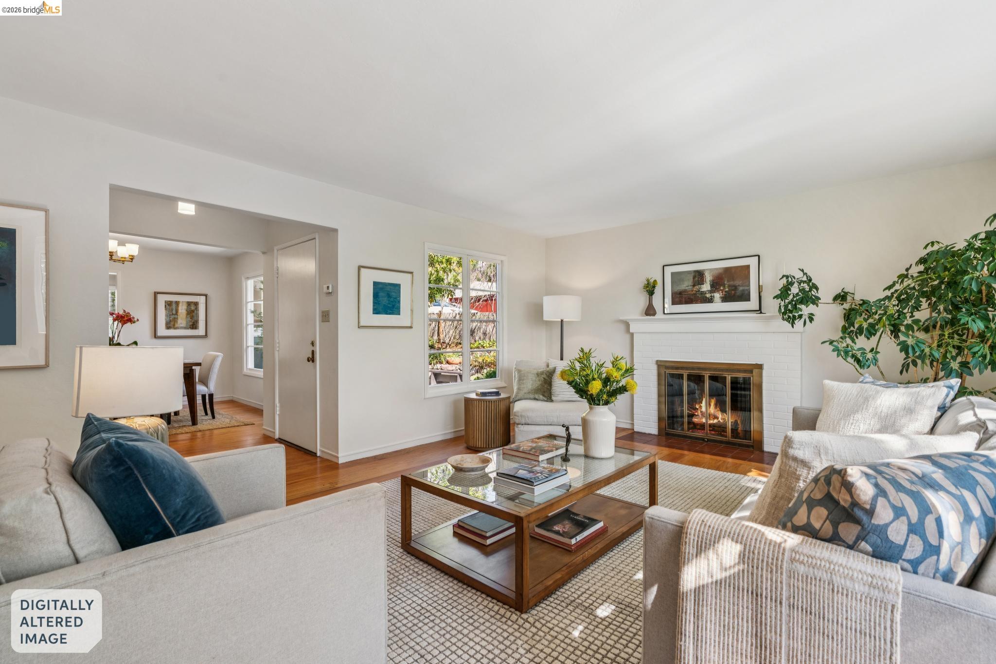 890 Keeler Avenue Berkeley, CA 94708 - Photo 1 of 39 a living room with furniture and a fireplace
