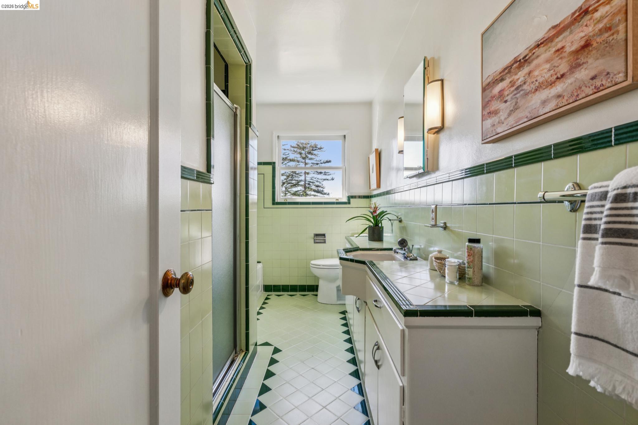 890 Keeler Avenue Berkeley, CA 94708 - Photo 27 of 39 a bathroom with a sink a toilet and shower