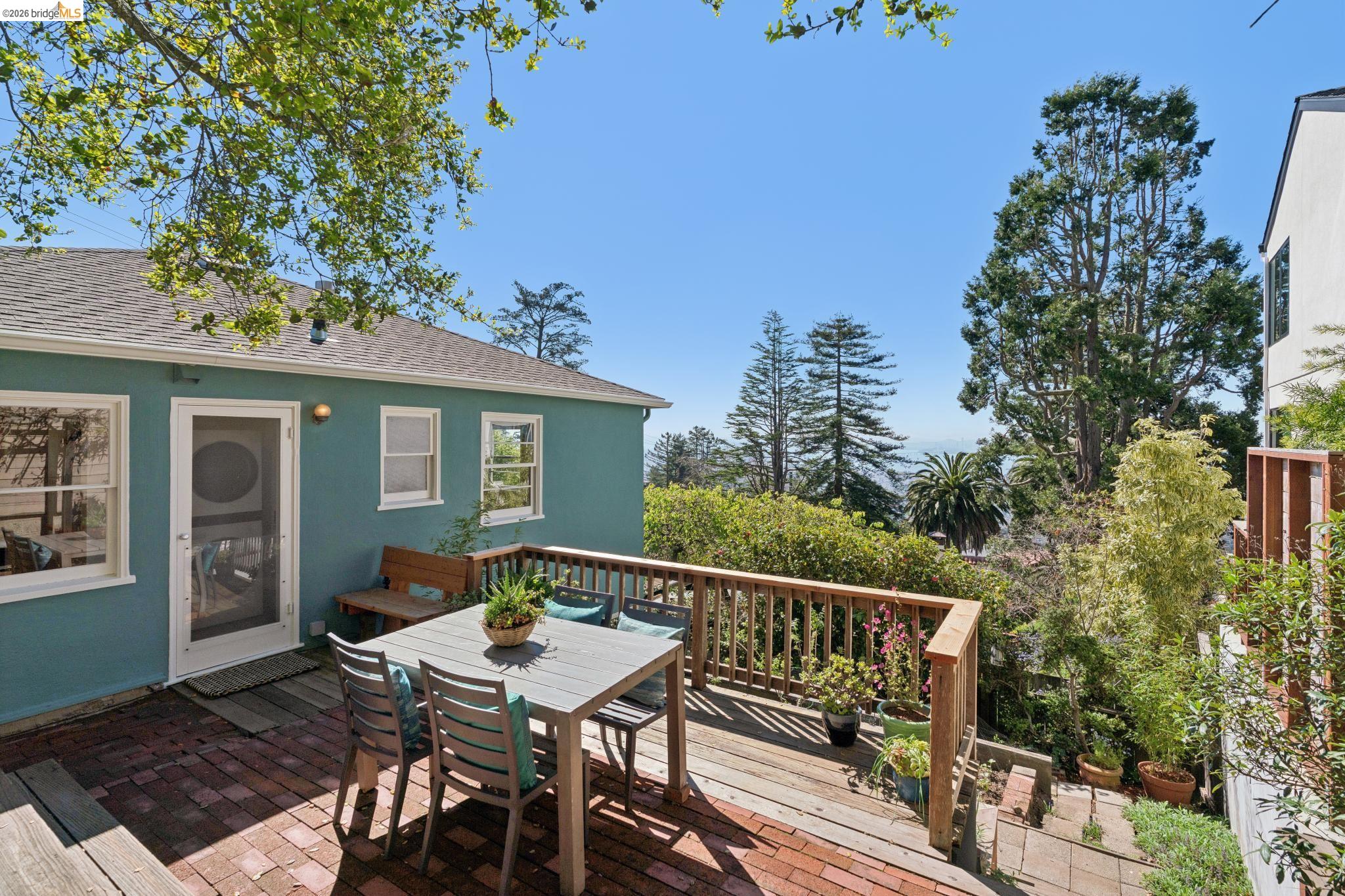 890 Keeler Avenue Berkeley, CA 94708 - Photo 32 of 39 a balcony with wooden floor table and chairs