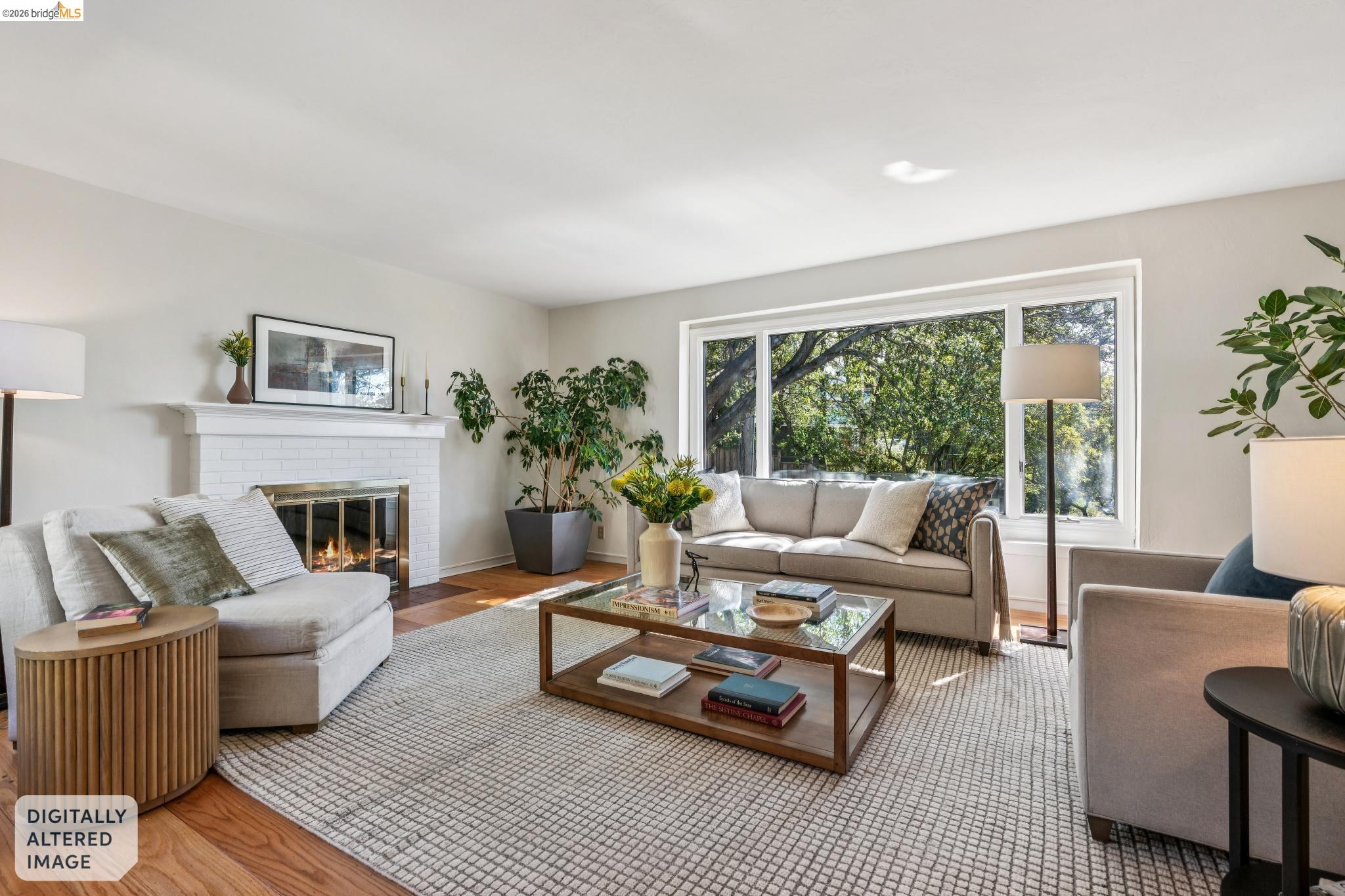 890 Keeler Avenue Berkeley, CA 94708 - Photo 8 of 39 a living room with furniture a large window and a fireplace