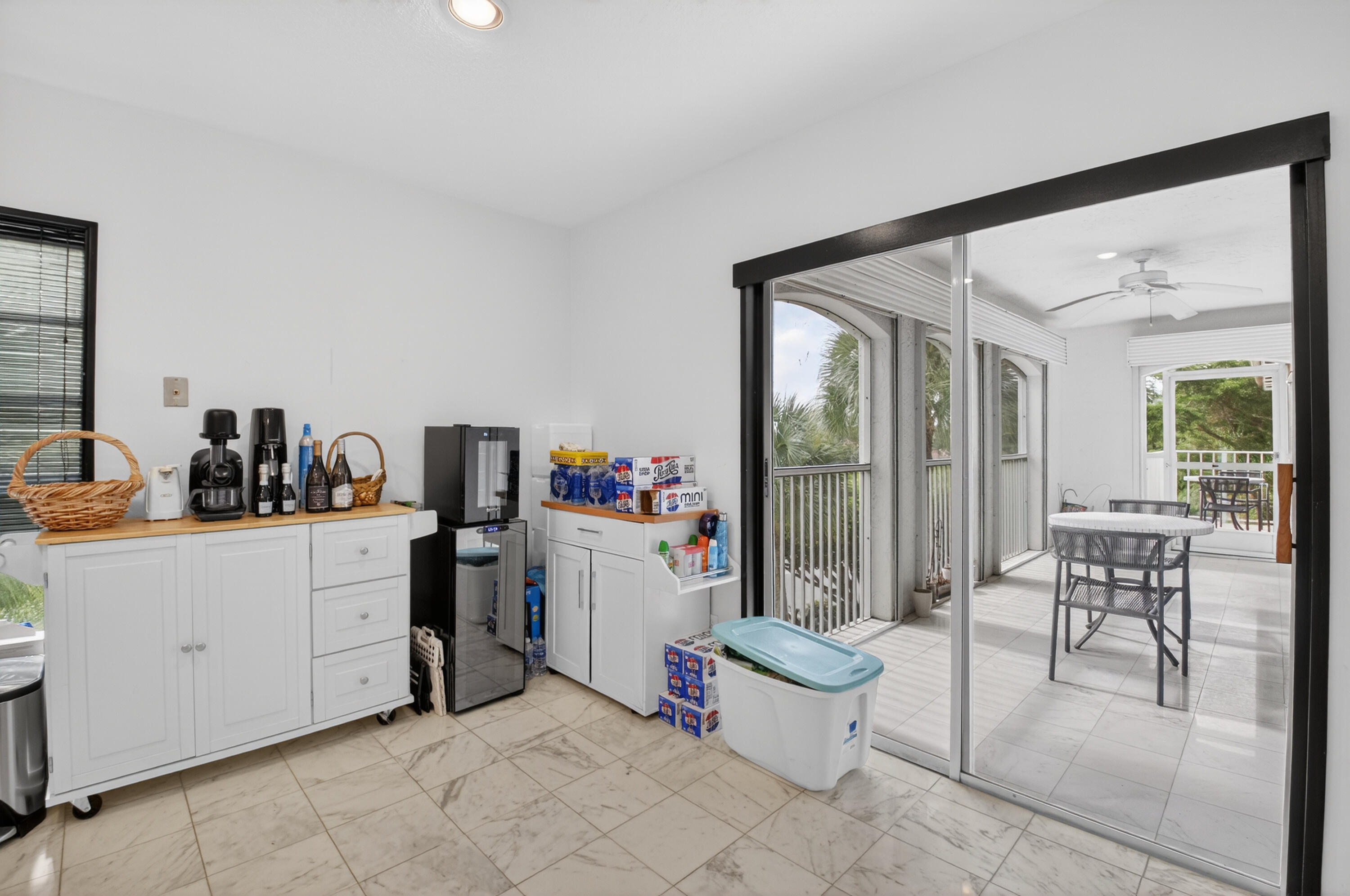 7369 Orangewood Lane, Unit 307 Boca Raton, FL 33433 - Photo 13 of 37 a room with a couch and a table in it