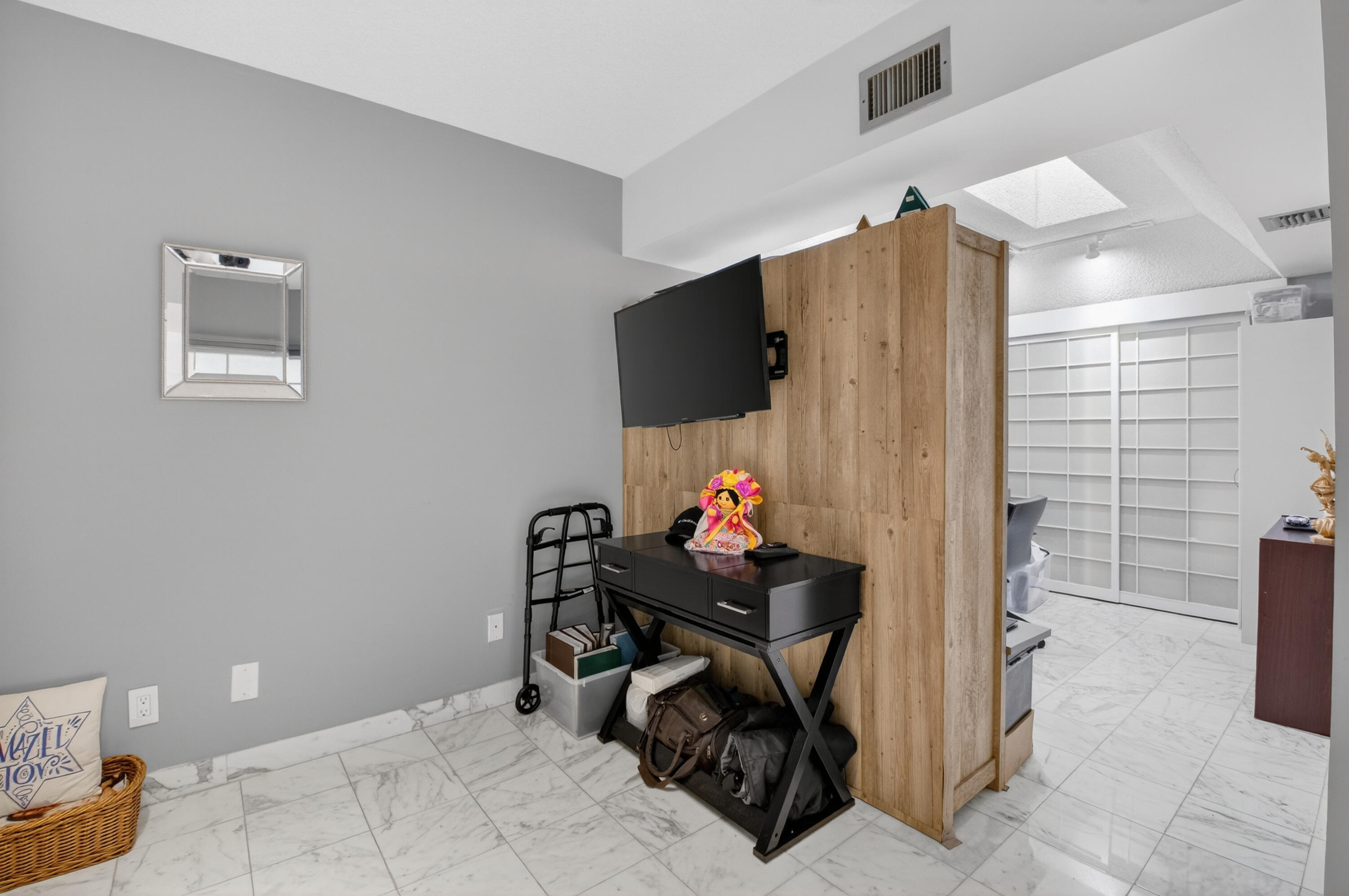 7369 Orangewood Lane, Unit 307 Boca Raton, FL 33433 - Photo 17 of 37 a view of room with window and furniture