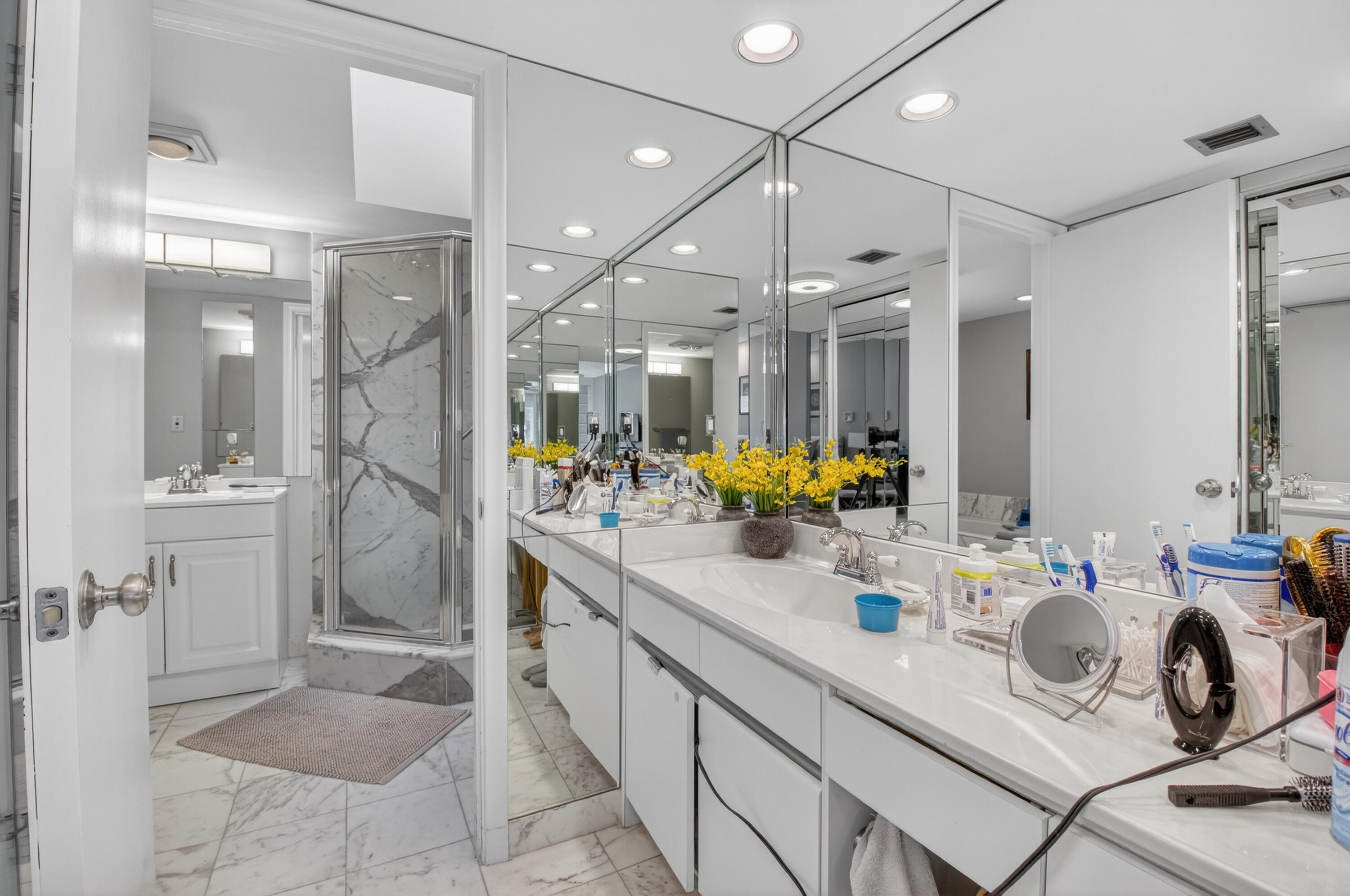 7369 Orangewood Lane, Unit 307 Boca Raton, FL 33433 - Photo 22 of 37 a kitchen with a sink appliances and cabinets