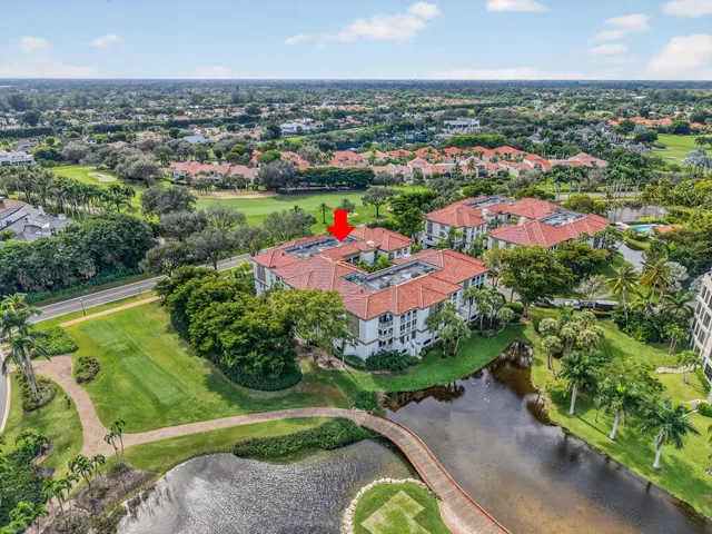 an aerial view of a house with a garden