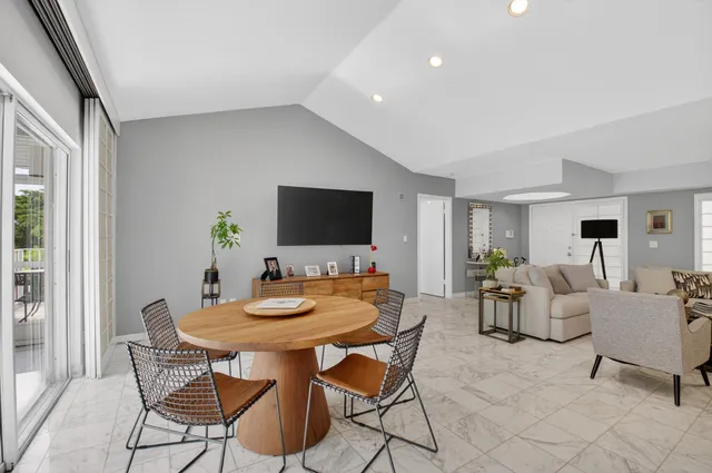 a view of a dining room with furniture