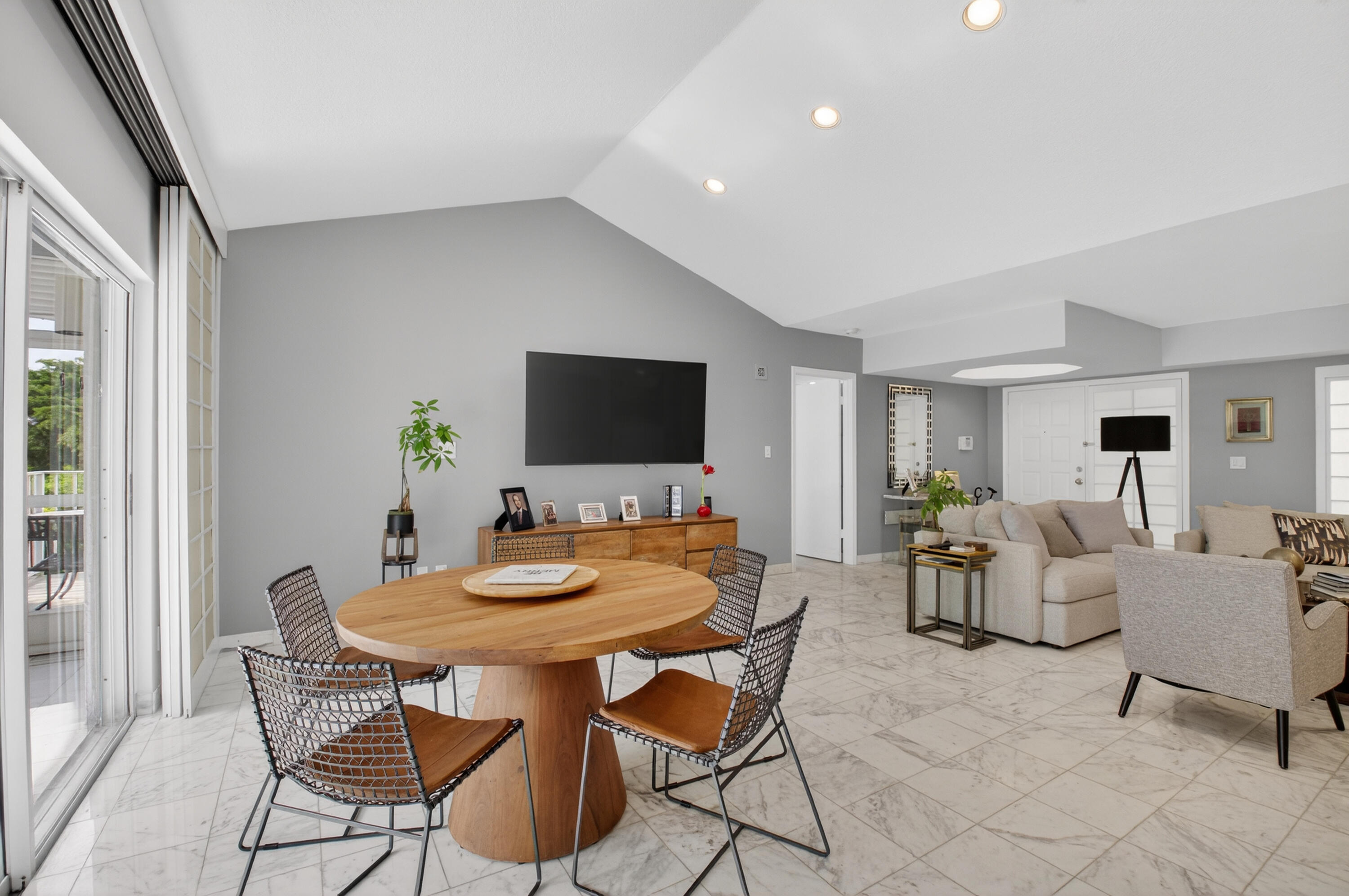 7369 Orangewood Lane, Unit 307 Boca Raton, FL 33433 - Photo 9 of 37 a view of a dining room with furniture
