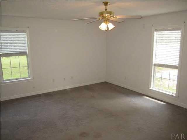 5920 Jack Stokes Road Baker, FL 32531 - Photo 4 of 10 Master bedroom