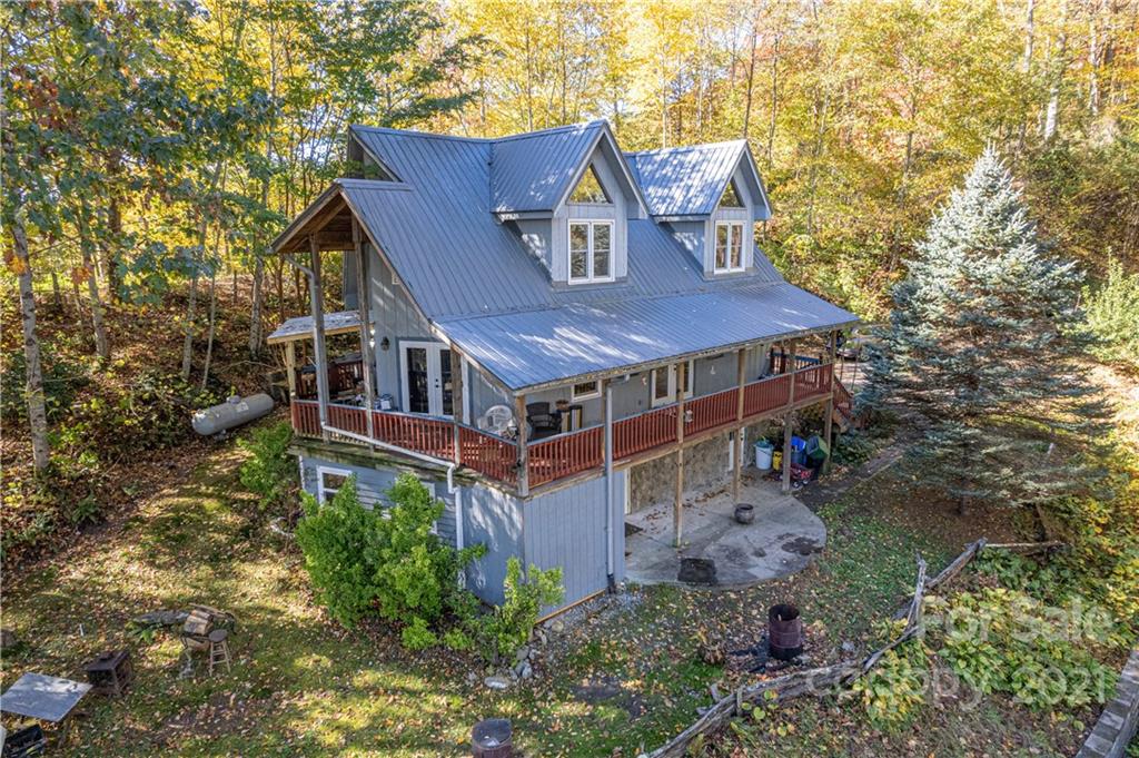 1595 Kitchens Branch Road Sylva, NC 28779 - Photo 1 of 45 an aerial view of a house with a yard