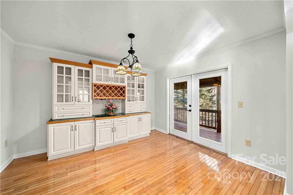 1595 Kitchens Branch Road Sylva, NC 28779 - Photo 21 of 45 a bedroom with furniture and window