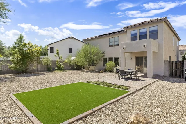 a view of a house with a patio