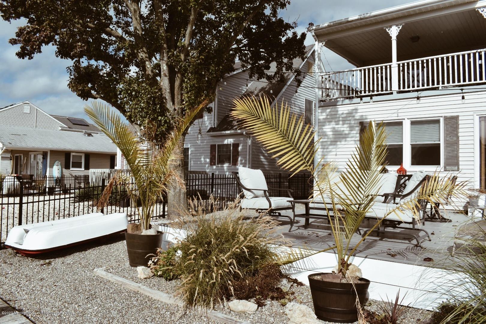 30 Amherst Drive Bayville, NJ 08721 - Photo 5 of 9 a view of a house with backyard and sitting area