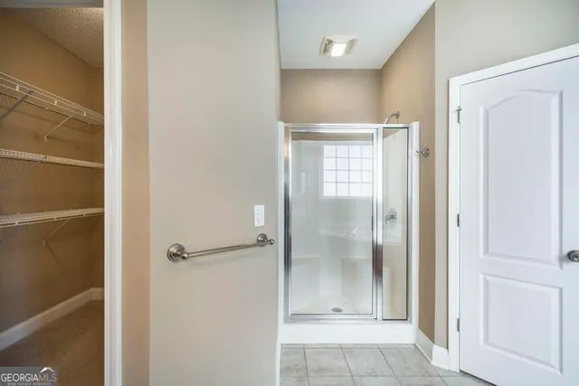 a bathroom with a sink and a window