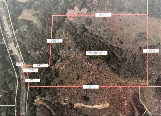 a view of backyard with green space