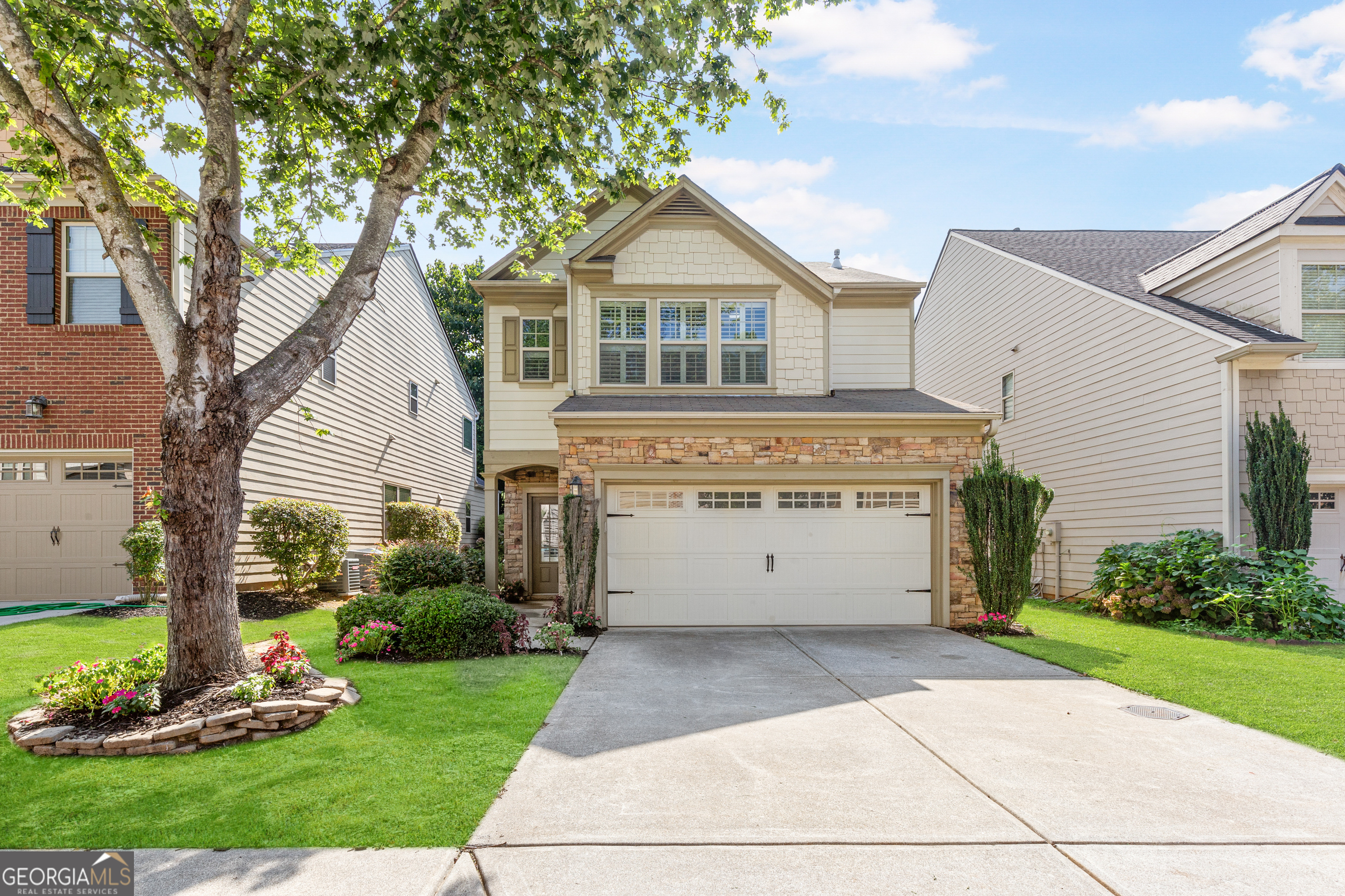 a view of a house with a garden