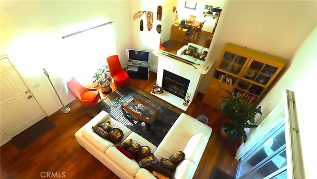 a bedroom with a bed and a large mirror